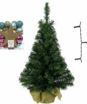 Kleine kunst kerstboom met verlichting en kerstballen goud fuchsia